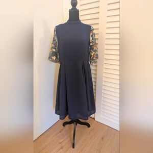 Elegant Navy Midi Dress with Embroidered Floral Sleeves